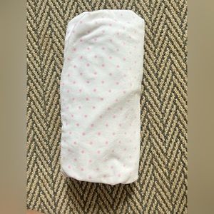 Pottery Barn Kids pink and white polka dot crib sheet